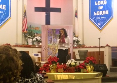 Woman singing in church