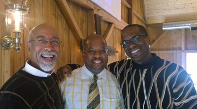 3 smiling African-American men.